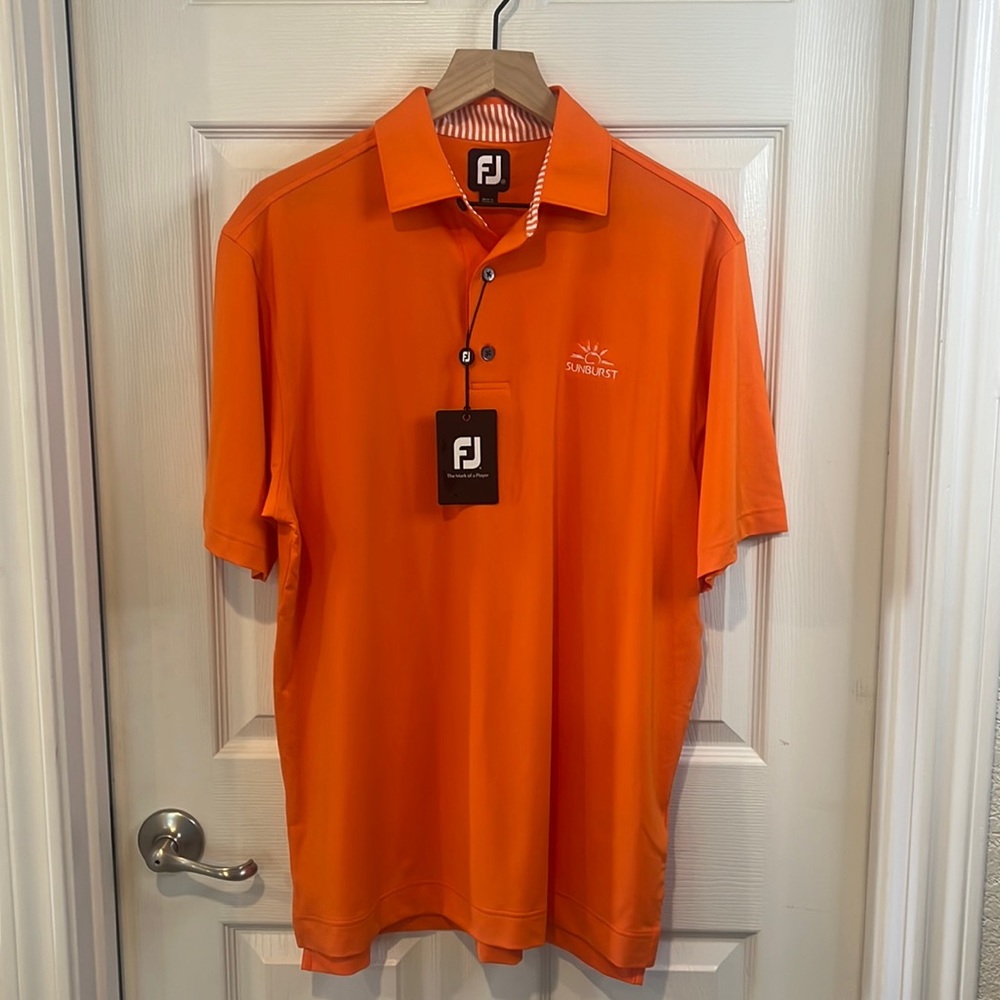 FootJoy Men’s Polo ORANGE NWT MD does have “sunburst logo”